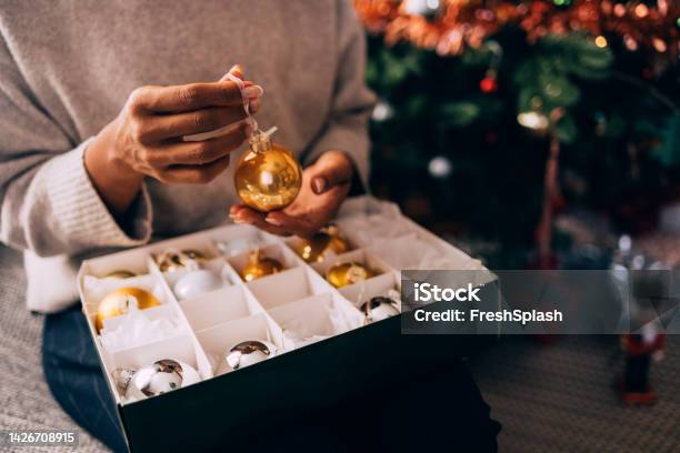 Woman Holding A Bauble Stock Photo - Download Image Now - Christmas Ornament, Box - Container, Happiness