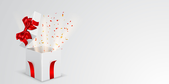 Festive illustration with open white gift box with red ribbons and bow. Pieces of serpentine and rays of light fly out of it