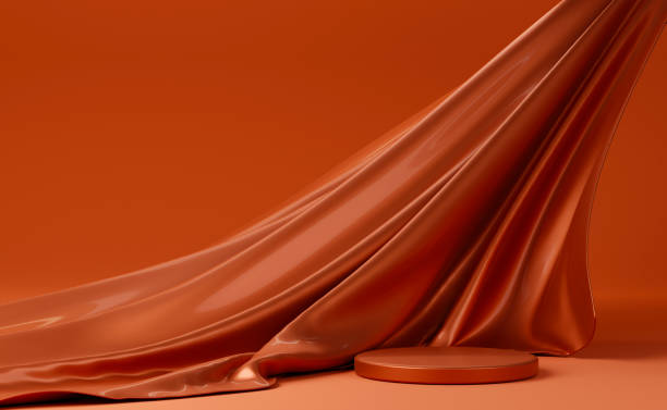 istock Dark orange podium with pink flying fabric, cloth background 1426729441