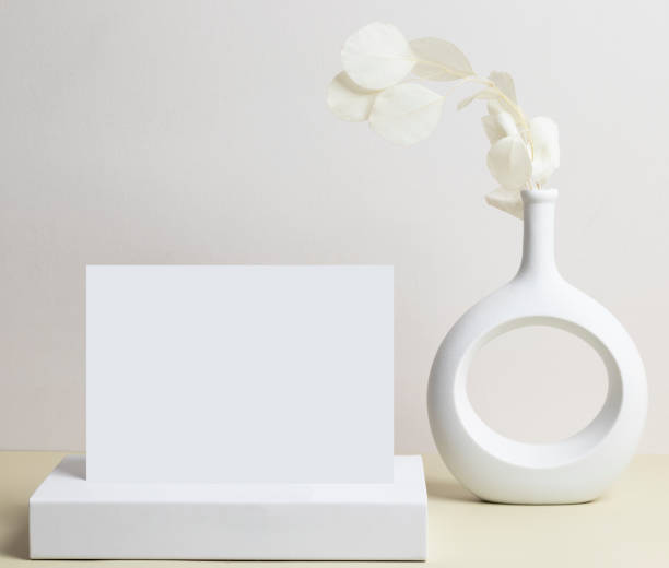 istock greeting card front view and dry flower in vase ceramic on table 1426740418