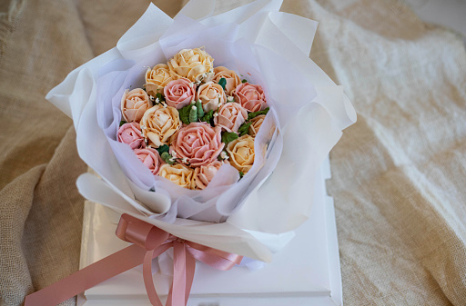 Set of delicate pink roses, bows and leaves isolated on white background.