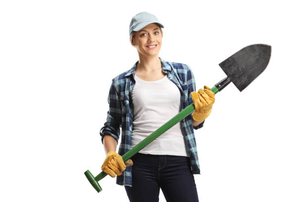 istock Young female farmer holding a shovel 1426754569
