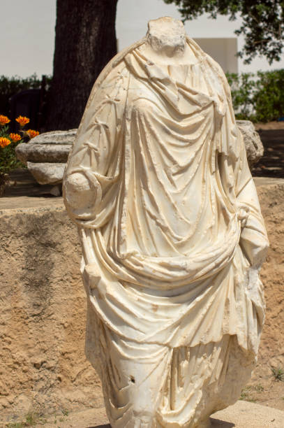 istock Marble statue at Roman era ruins, Carthage, Tunisia 1426755937