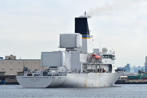 Kanagawa Prefecture, Japan - September 03, 2022:United States Navy USNS Howard O. Lorenzen (T-AGM-25) Missile Range Instrumentation Ship departing from Yokohama Port in Japan.