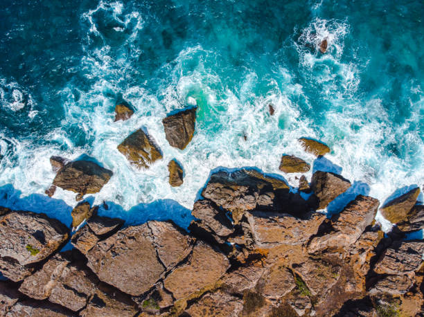 istock High Angle View Of Sea By Rock Formation 1426778163