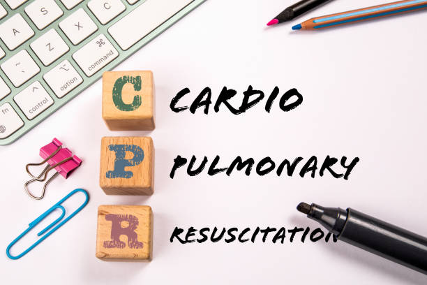 istock CPR - Cardiopulmonary Resuscitation. Stationery and computer keyboard on a white background 1426779526