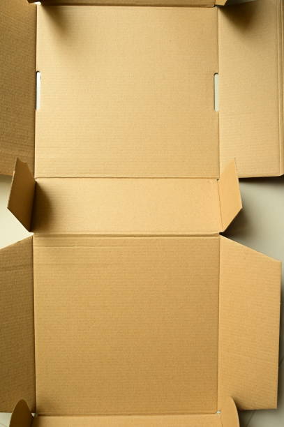 istock brown paper box textured background 1426785386