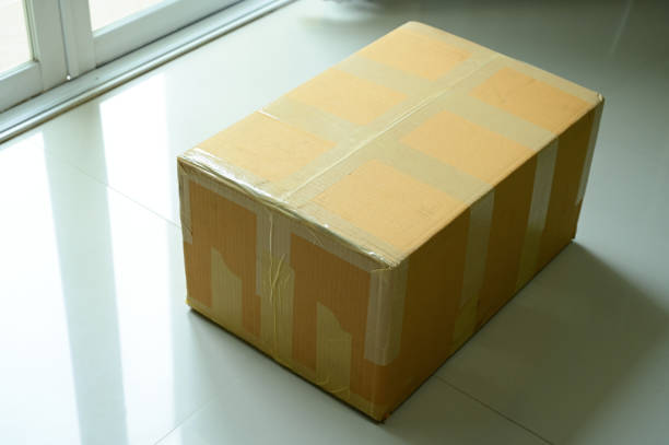 istock brown box packaging for shipping, paper textured 1426785400