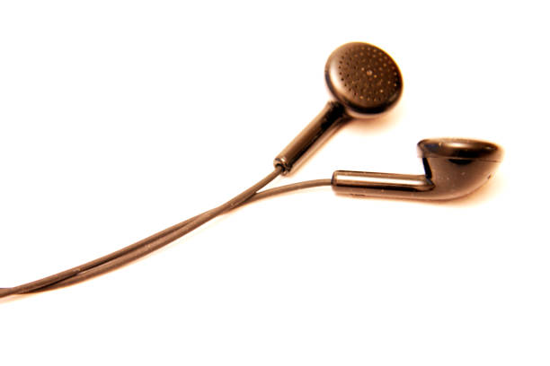 A headphone on red color background.