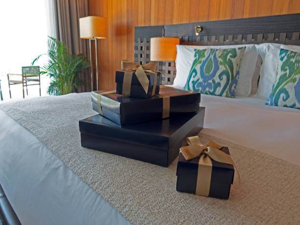 Gift wrapping on the bed stock photo
