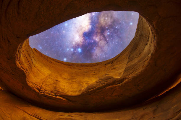 istock Inside the stone hole with Milky Way. 1426793165