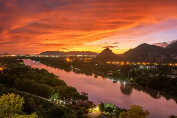 Beautiful landscape in the morning of the Kwai Noi River curve and the mountains at the Golden Chedi Viewpoint Wat Tham Khao Pun, Kanchanaburi.