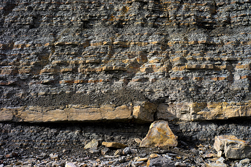 Formation of a stacked layers of rock over million of years