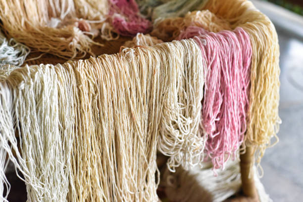 istock Many colorful prepared threads for weaving hammocks in vietnam 1426801556