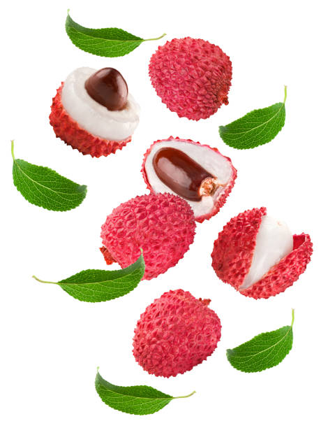 istock flying fresh lychee with slices and green leaves isolated on white background. clipping path 1426805933