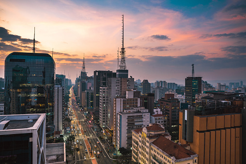 Aerial View of Paulista Avenue Buildings Sao Paulo City by Colorful Sunset.