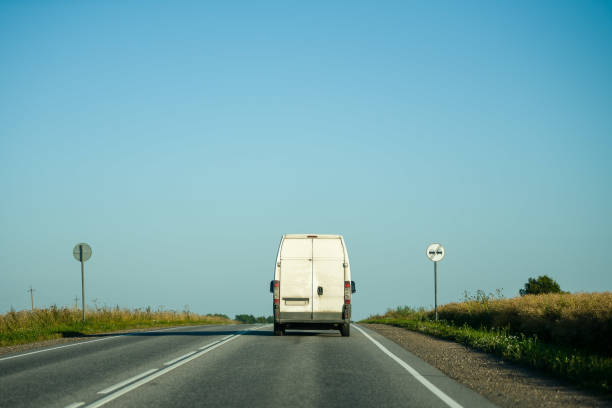 istock A white car and a sign allowing overtaking 1426813538