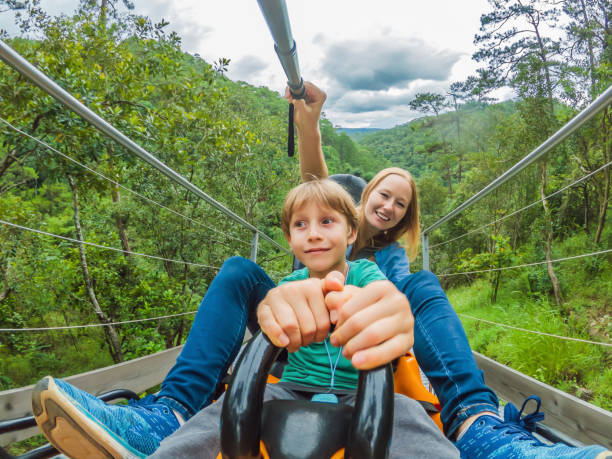 Mother and son on the alpine coaster