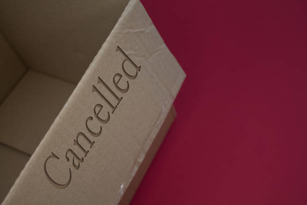 istock Cancelled word with cardboard box. Brown folded card box. 1426826394