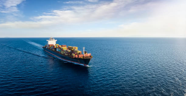 istock Panoramic aerial view of a cargo ship carrying containers 1426834146