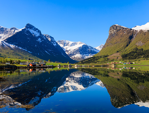 Innfjorden is a village in Rauma Municipality in Møre og Romsdal county, Norway. It is situated about 10 kilometres southwest of the town of Åndalsnes and 9 kilometres southeast of the village of Måndalen along the European Route E136 highway
