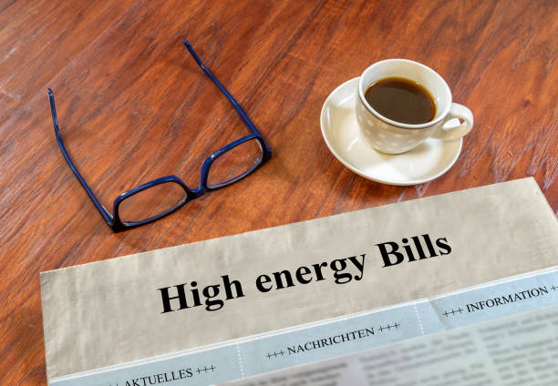 istock High energy Bills newspaper with glasses and coffee on a desk 1426836628