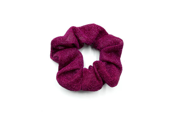 istock Purple hair scrunchie isolated on white background. 1426841313
