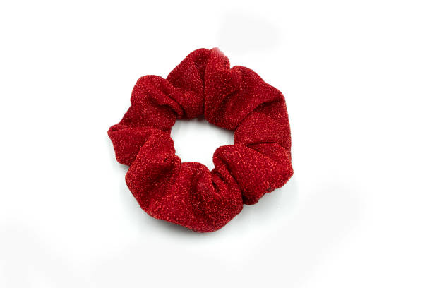 istock Red hair scrunchie isolated on white background. 1426841314