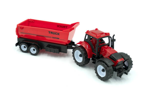 istock Toy tractor isolated on white background. 1426841705