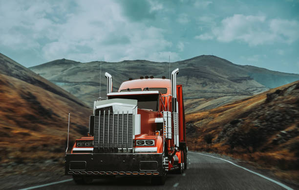 A red truck runs on a mountain road. A red truck runs on a mountain road. 3d render and illustration. semi truck stock pictures, royalty-free photos & images
