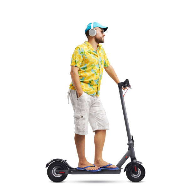 istock Cool young man riding an electric scooter 1426842643