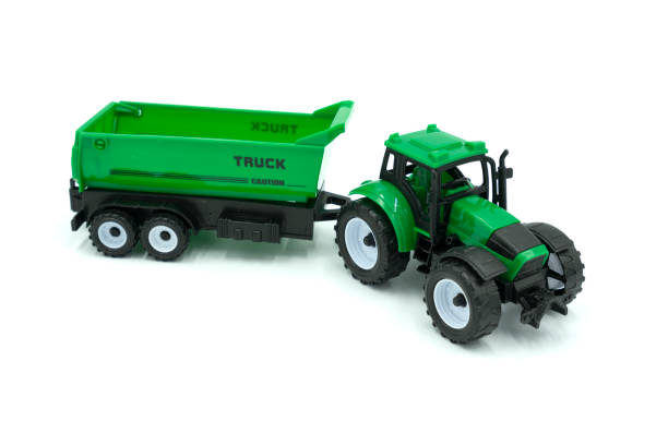 istock Toy colurfull tractor isolated on white background. 1426843640