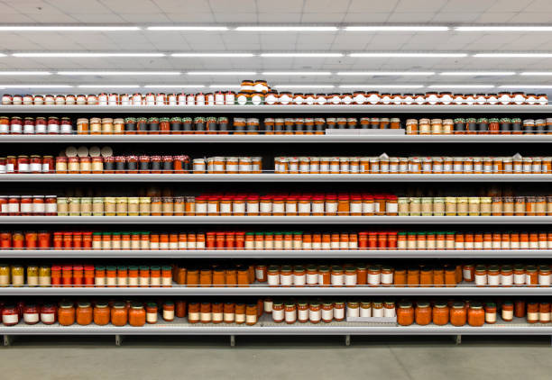 salsa jars on shelf - ice shelf imagens e fotografias de stock