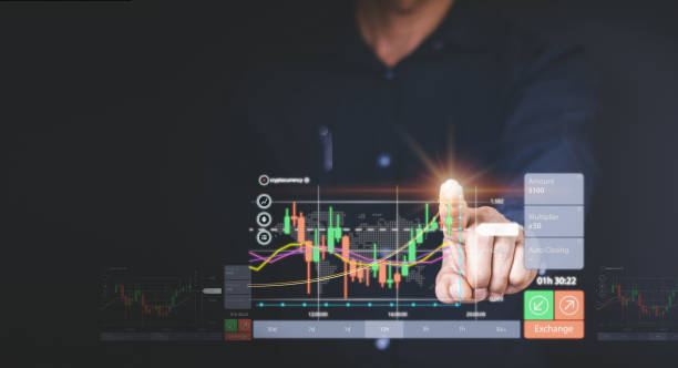 istock Businessman or trader is pointing a growing virtual hologram stock, planning analyze indicator and strategy buy and sell, Stock market, Business growth, progress or success concept.nvest in trading 1426843882