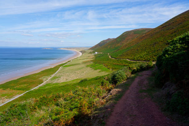 istock Across Rhossili Bay on a winding footpath 1426844325