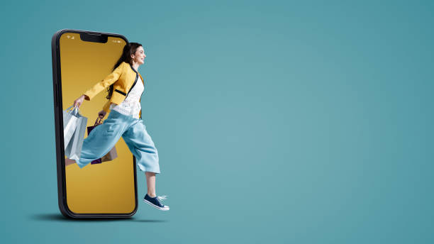 istock Cheerful woman doing online shopping 1426848425