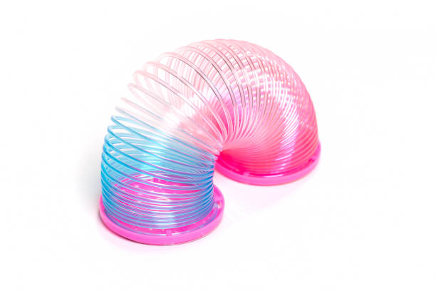 istock Toy plastic colorful rainbow spiral for play isolated on white 1426848838