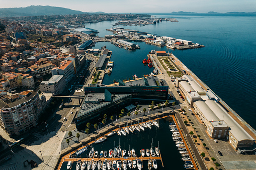 Vigo, Spain - September 23, 2022: Cityscape of Vigo with moored yachts in Vigo, Galicia, Spain.