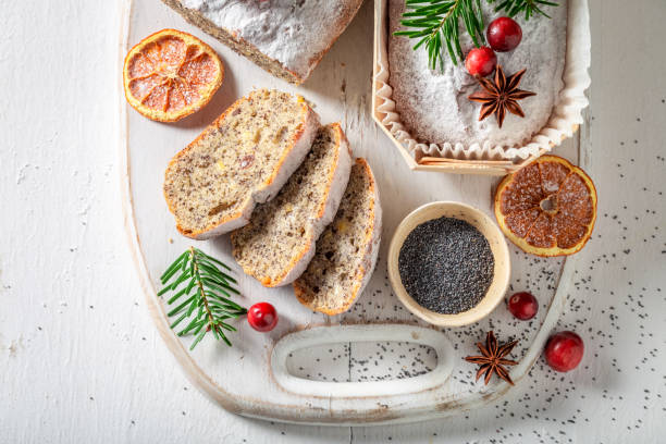 istock Poppy seed cake for Christmas ornamented with spruce and cranberries 1426863041