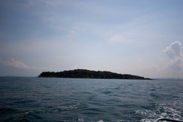 istock Sea landscape view with mountain in background, blue sky and white cloud while heading to Koh Lan Island, Pattaya, Chonburi, Thailand 1426864979