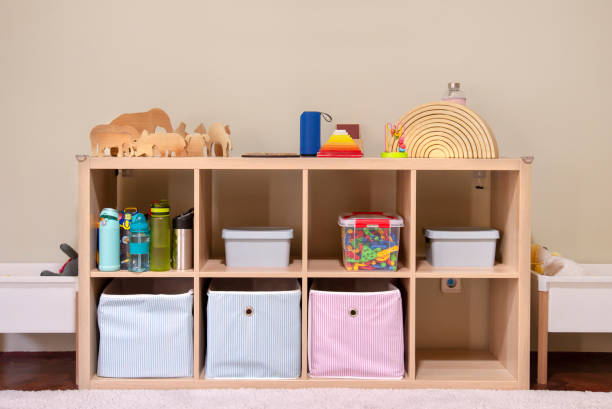 istock A kindergarten school room with shelves and colourful pink and blue boxes 1426865000