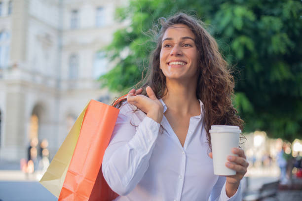 istock Young woman coming back from shopping 1426868116