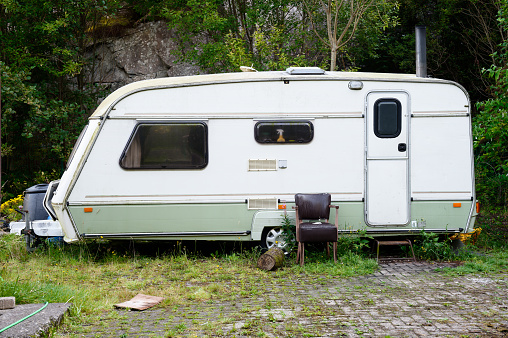 Caravan abandoned and dumped in park waiting to be removed UK