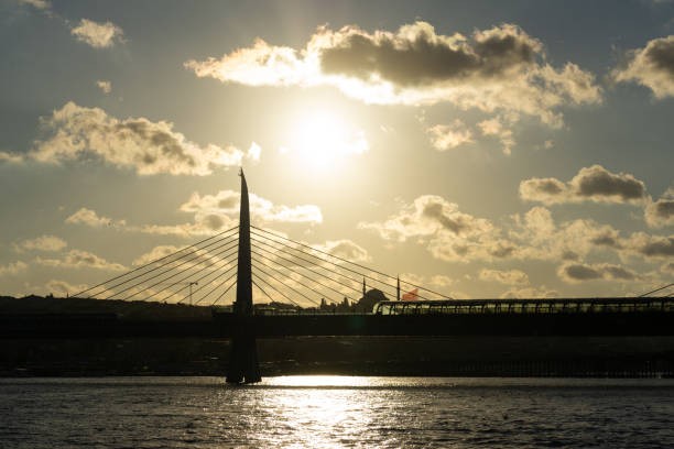 istock Sunset in Istanbul with bridge and clouds 1426879302