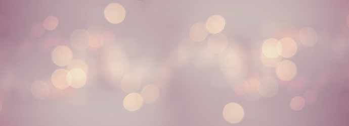 Bokeh background for christmas, defocused round lights in pastel color, flare overlay