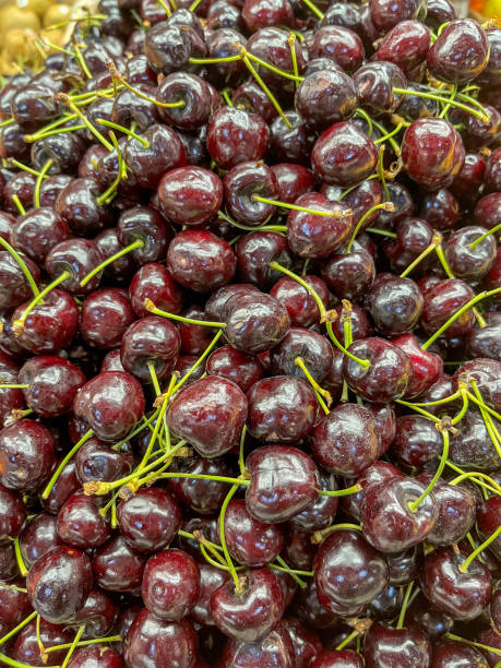 istock Cherries on market stall 1426885480
