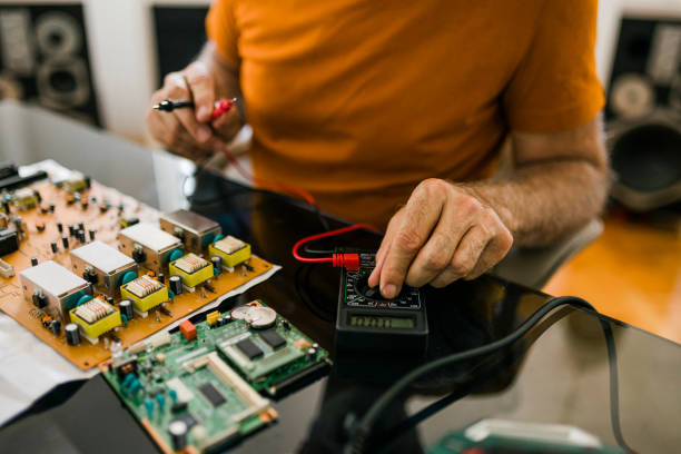 istock Close up of Computer repair service. Hardware support. Electronic technology. Shot of technician fixing laptop cooler. 1426892156