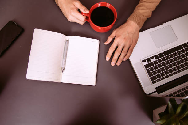 istock A young attractive student is working on a laptop. 1426894819