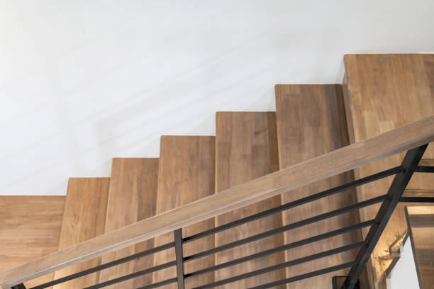 istock wooden modern stairs and railing 1426899127