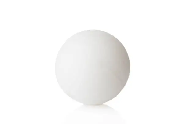 Photo of Ping-pong plastic ball close up on a white background